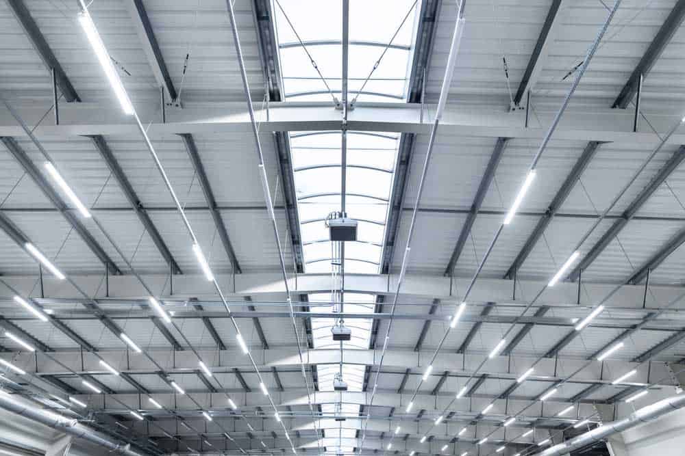 LED lights illuminating a modern transport warehouse