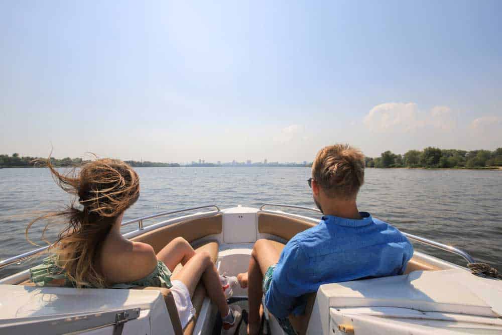 A couple enjoying a boat ride