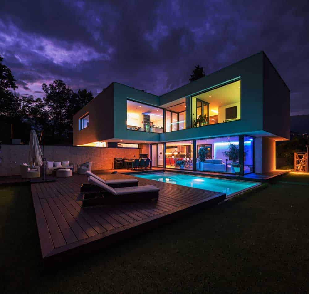 A modern villa with colored LED lights