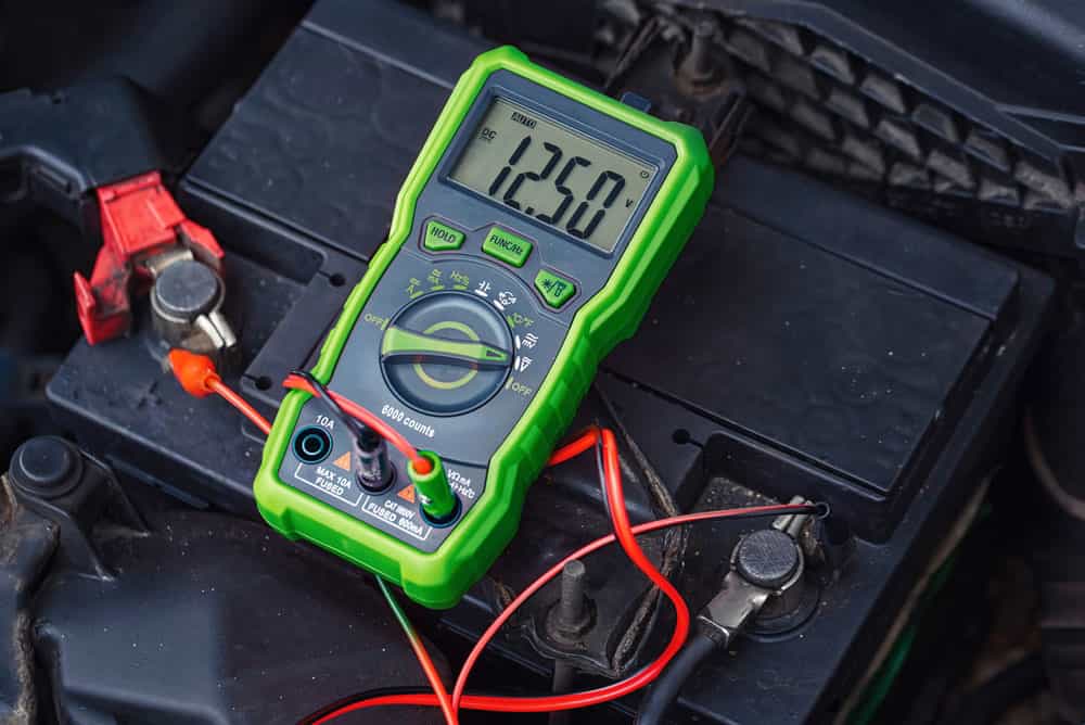 Testing voltage of a 12V battery using a multimeter